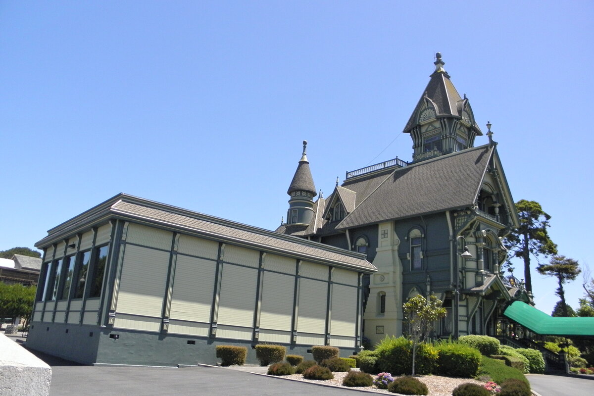 Full view of Carson Mansion showcasing complete architecture